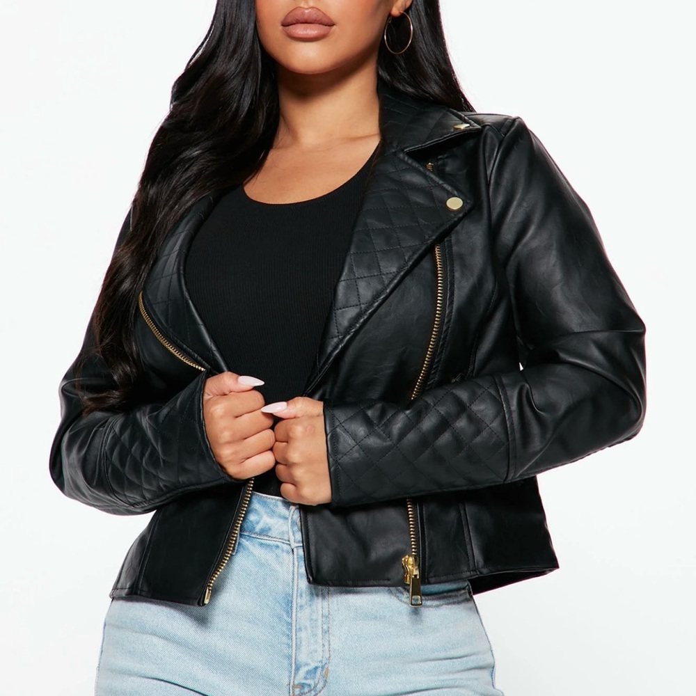 Black faux leather jacket with gold accents